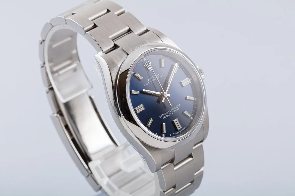 2021 36mm Rolex Oyster Perpetual 126000 Bright Metallic Blue Dial Box & Card